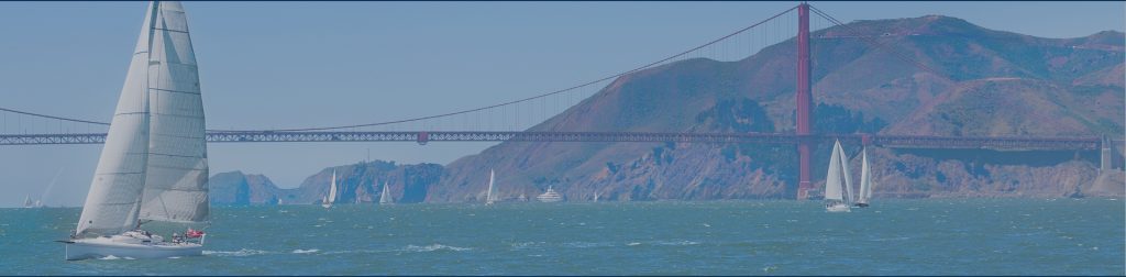 Golden gate bridge and yachts sailing in the San Francisco bay
