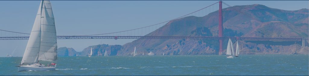 Golden gate bridge and yachts sailing in the San Francisco bay